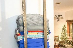 Easy DIY Blanket Holder Ideas + Plans For You! The DIY Hub: Creative Crafts, Repairs & Life Hacks Easy DIY Blanket Holder Ideas + Plans For You! | The DIY Hub: Creative Crafts, Repairs & Life Hacks